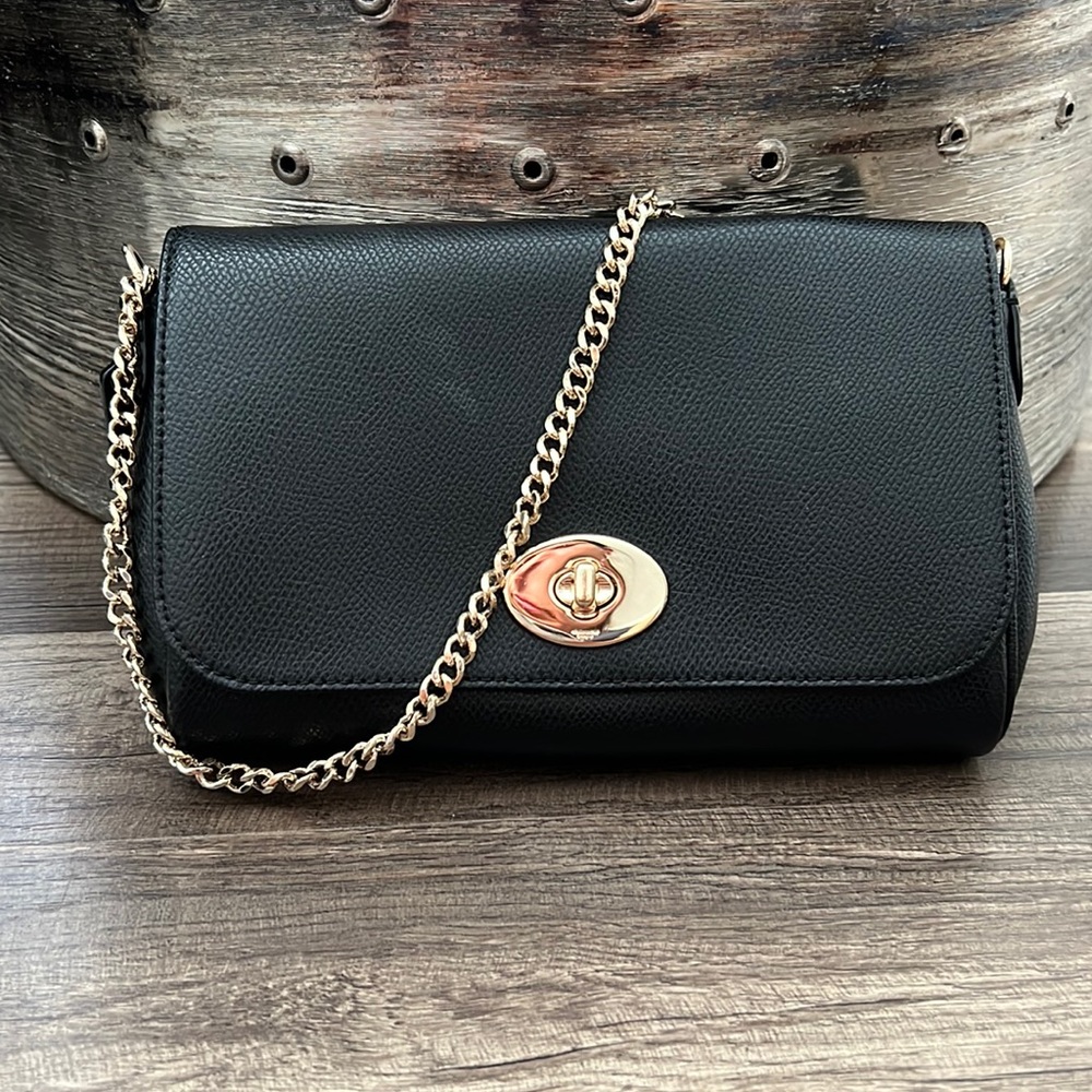 Small Black Coach dressy shoulder bag with gold hardware